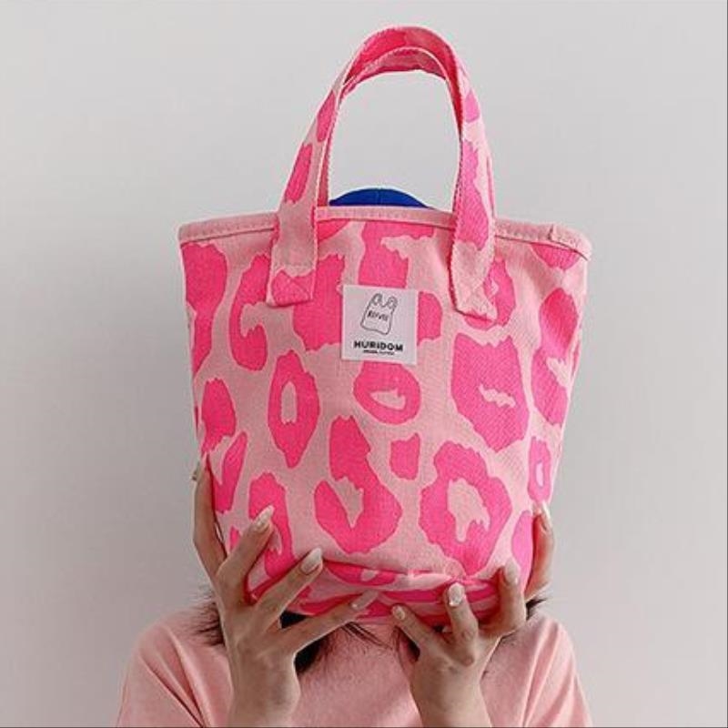 粉红色水桶包 粉红色豹纹包大容量帆布单肩手提包女水桶包2021新款休闲托特包袋_推荐淘宝好看的粉红色水桶包