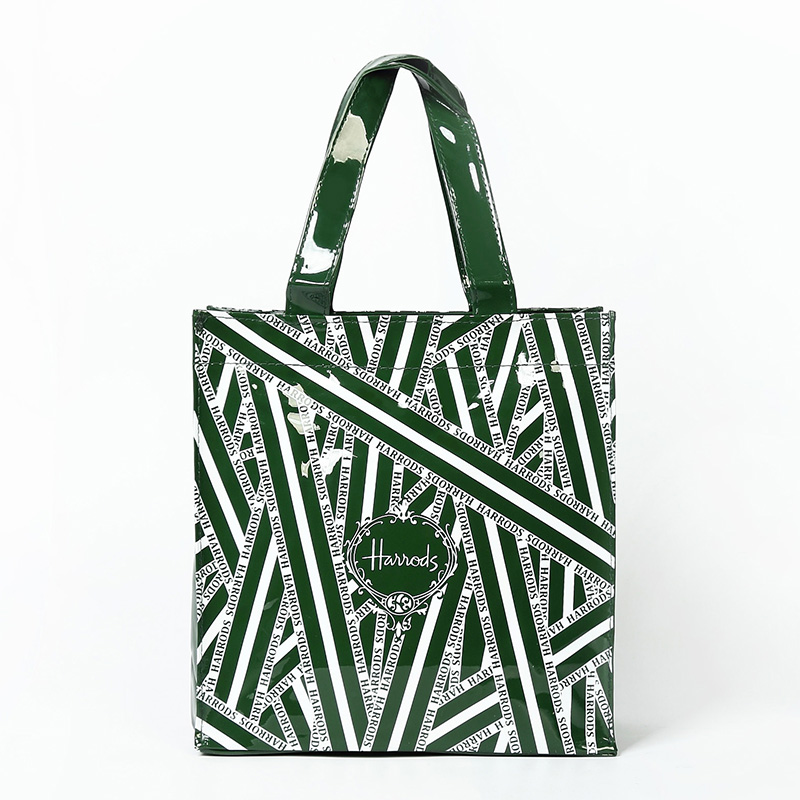 绿色手提包 欧美时尚pvc环保购物袋墨绿色爱心条纹大容量防水手提袋单肩包_推荐淘宝好看的绿色手提包