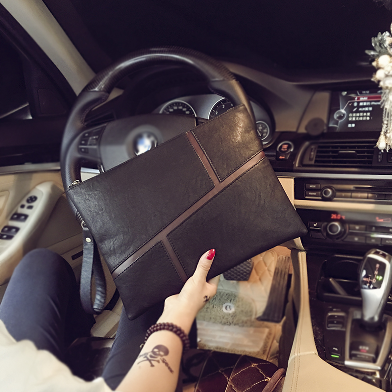 Hong Kongs new men hand bag Korean version of handbag business leisure trend hand bag envelope package