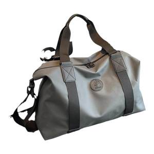 Short-term travel bag for women with lightweight and stylish outings, large capacity business trip duffel bag, high-end new style women's handbag 
Short-term travel bag for women with lightweight and stylish outings, large capacity business trip duffel bag, high-end new style women's handbag