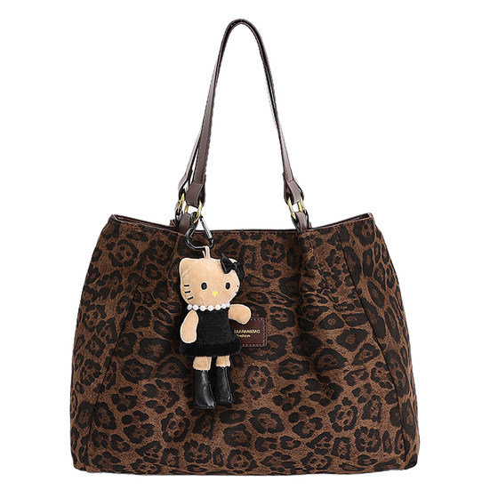 Daily commuting versatile bag women's 2025 new autumn and winter niche light luxury luxury leopard print shoulder tote bag 
Daily commuting versatile bag women's 2025 new autumn and winter niche light luxury luxury leopard print shoulder tote bag