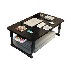 Folding table on bed in student dormitory Folding table on bed in student dormitory