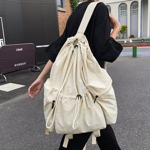 Japanese casual backpack men's drawstring pocket women's lightweight sports travel backpack boys college bag 
Japanese casual backpack men's drawstring pocket women's lightweight sports travel backpack boys college bag