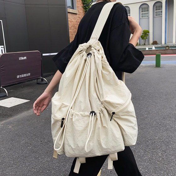 Japanese casual backpack men's drawstring pocket women's lightweight sports travel backpack boys college bag 
Japanese casual backpack men's drawstring pocket women's lightweight sports travel backpack boys college bag