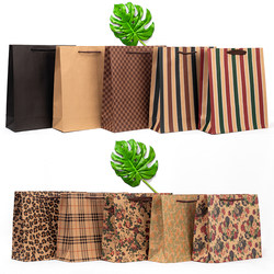 Fashionable Hand-Held Kraft Paper Bag for Men's and Women's Clothing, Spring and Summer Suits, Thin Sweatshirts, Long Pants, Shoe Box Packaging, Gift Bag, Medium Size Fashionable Hand-Held Kraft Paper Bag for Men's and Women's Clothing, Spring and Summer Suits, Thin Sweatshirts, Long Pants, Shoe Box Packaging, Gift Bag, Medium Size