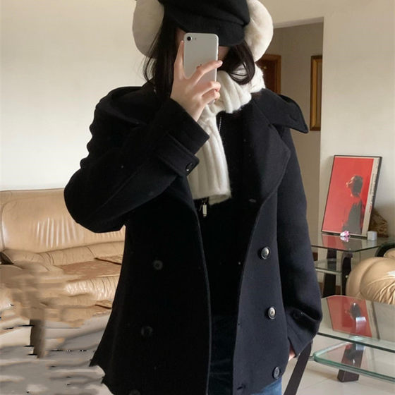 Korean retro black stand collar double-breasted woolen jacket for women in autumn and winter, high-end waist-hugging short coat
Korean retro black stand collar double-breasted woolen jacket for women in autumn and winter, high-end waist-hugging short coat