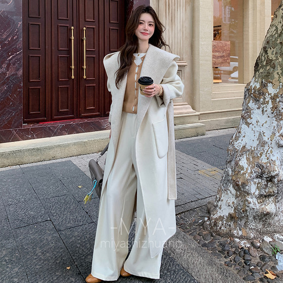 Two-color two-sided wool double-sided tweed mid-length over-knee hooded loose coat lacing coat for women's autumn new style
Two-color two-sided wool double-sided tweed mid-length over-knee hooded loose coat lacing coat for women's autumn new style