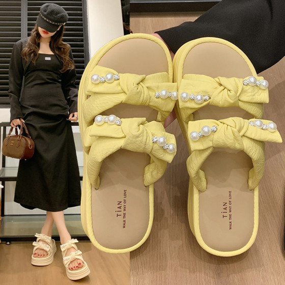 Super hot thick-soled sandals for women 2025 summer new versatile bow with skirt pearl beach flip flops
Super hot thick-soled sandals for women 2025 summer new versatile bow with skirt pearl beach flip flops