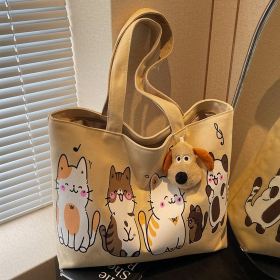 Summer cartoon cat canvas bag 2025 new commuter tote bag large capacity travel one-shoulder tote bag
Summer cartoon cat canvas bag 2025 new commuter tote bag large capacity travel one-shoulder tote bag
