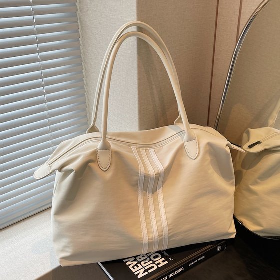 Lightweight nylon canvas bag women's large capacity short-distance travel commuter tote bag outdoor sports shoulder tote large bag
Lightweight nylon canvas bag women's large capacity short-distance travel commuter tote bag outdoor sports shoulder tote large bag