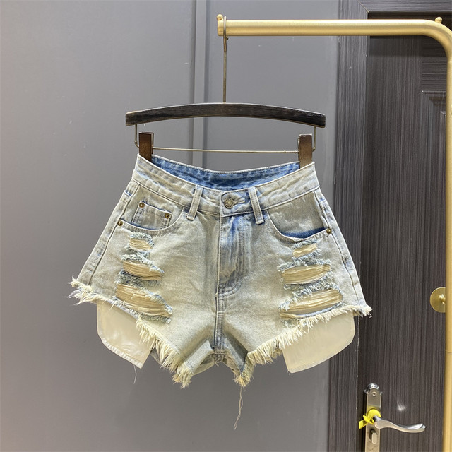 2025 summer new high-waisted slimming legs and wide-leg A-line hot pants design ripped bristled denim shorts for women 
2025 summer new high-waisted slimming legs and wide-leg A-line hot pants design ripped bristled denim shorts for women