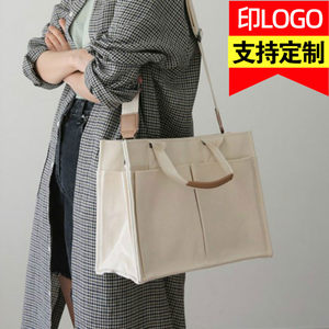 2025 new women's a4 file handheld briefcase Tote commuting large capacity work and work canvas bag customization 
2025 new women's a4 file handheld briefcase Tote commuting large capacity work and work canvas bag customization