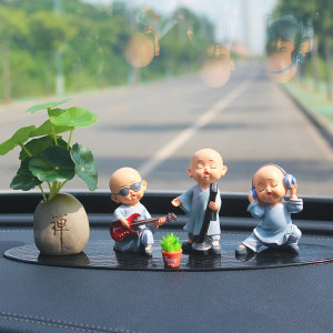 Creative car ornaments band little monk t car decoration supplies center console car interior accessories car aromatherapy men 
Creative car ornaments band little monk t car decoration supplies center console car interior accessories car aromatherapy men
