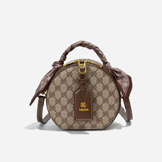 This year's most popular bags, women's 2025 new super popular niche handheld small round bag, versatile single shoulder crossbody bag 
This year's most popular bags, women's 2025 new super popular niche handheld small round bag, versatile single shoulder crossbody bag