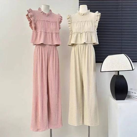 Fashion suit temperament spliced black fungus small flying sleeve top for women in summer high waist draped straight wide-leg pants two-piece set
Fashion suit temperament spliced black fungus small flying sleeve top for women in summer high waist draped straight wide-leg pants two-piece set