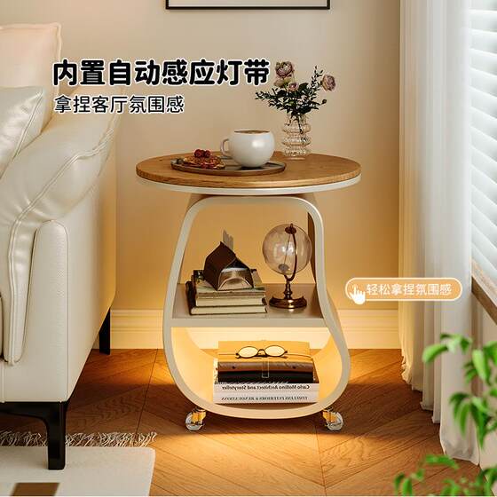 Living room sofa side table movable coffee table small round table small apartment round side cabinet mini creative storage rack
Living room sofa side table movable coffee table small round table small apartment round side cabinet mini creative storage rack