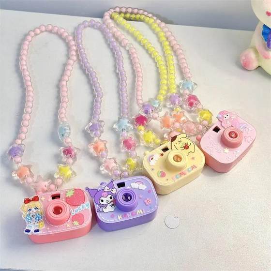 Children's mini projection necklace camera elementary school student taking photos toys girls jewelry cartoon pendants
Children's mini projection necklace camera elementary school student taking photos toys girls jewelry cartoon pendants