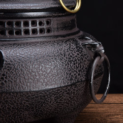 Tang Dynasty sencha tea boiler ghost face wind stove cast iron stove charcoal fire iron kettle tea boiler V stove fire bowl wind pot kung fu Tang Dynasty sencha tea boiler ghost face wind stove cast iron stove charcoal fire iron kettle tea boiler V stove fire bowl wind pot kung fu