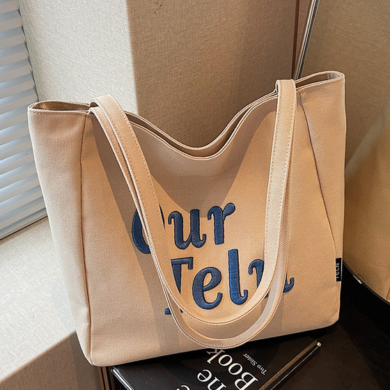 Large capacity canvas bag for women 2025 new summer fashion versatile lazy style shoulder bag student commuter shopping bag
Large capacity canvas bag for women 2025 new summer fashion versatile lazy style shoulder bag student commuter shopping bag