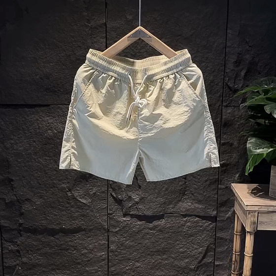 Summer thin ice silk quick-drying shorts for men's trendy brand loose casual quarter-finger pants couple drawstring solid color beach pants
Summer thin ice silk quick-drying shorts for men's trendy brand loose casual quarter-finger pants couple drawstring solid color beach pants