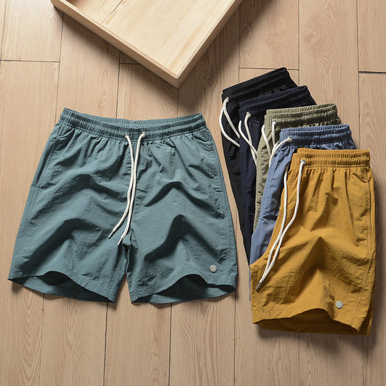 Weekend holiday style! Gaomi Nillets quickly dry and loose tightly. Summer sports fitness shorts men's beach pants Weekend holiday style! Gaomi Nillets quickly dry and loose tightly. Summer sports fitness shorts men's beach pants