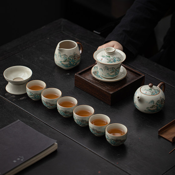 Hand-painted landscape celadon Kung Fu tea set set Chinese retro cover bowl teapot tea cup whole set of tea gifts
Hand-painted landscape celadon Kung Fu tea set set Chinese retro cover bowl teapot tea cup whole set of tea gifts