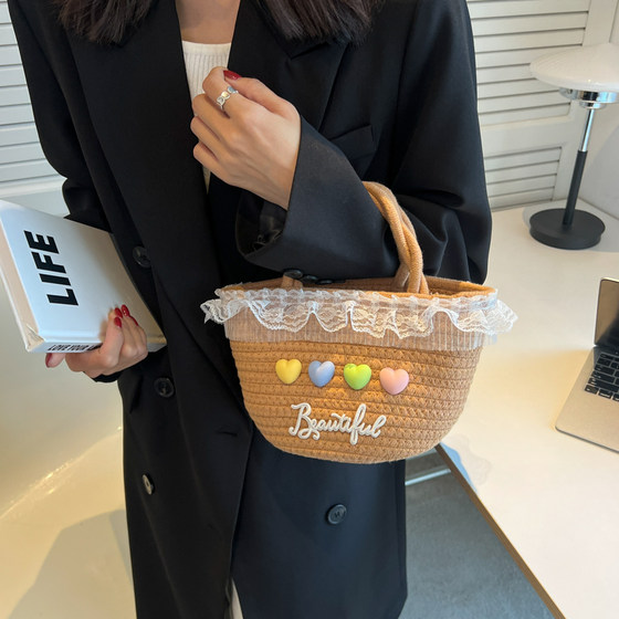 High-end textured bag for women summer 2024 new internet celebrity niche woven women's portable straw beach bucket bag 
High-end textured bag for women summer 2024 new internet celebrity niche woven women's portable straw beach bucket bag