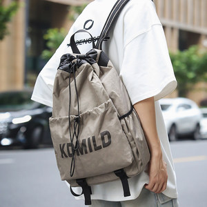 Drawstring ties pocket sports travel backpack men's lightweight outdoor hiking hiking bag college school bag women 
Drawstring ties pocket sports travel backpack men's lightweight outdoor hiking hiking bag college school bag women