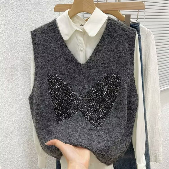 V-neck solid color sequin thin flash butterfly knitted vest for women with versatile high-end slim sweater vest autumn and winter new style
V-neck solid color sequin thin flash butterfly knitted vest for women with versatile high-end slim sweater vest autumn and winter new style