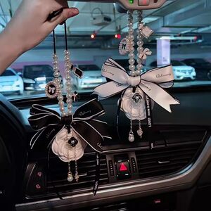 Car pendants 2025 new high-end rearview mirror pendant Internet celebrity women's fragrance diffusing camellia aromatherapy car hanging decoration 
Car pendants 2025 new high-end rearview mirror pendant Internet celebrity women's fragrance diffusing camellia aromatherapy car hanging decoration