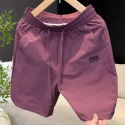 Men's mid-pants laser punched casual pants fashion Men's mid-pants laser punched casual pants fashion