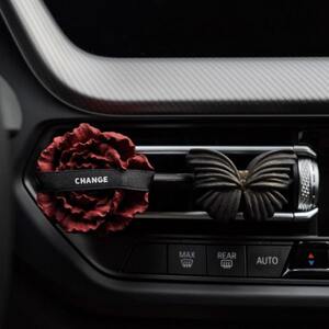 Rose red high-end clip-on small fragrance dead leaf car perfume butterfly low-wind vent car aromatherapy German automotive supplies 
Rose red high-end clip-on small fragrance dead leaf car perfume butterfly low-wind vent car aromatherapy German automotive supplies