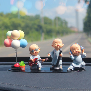 Creative car ornaments band little monk car decoration supplies G center console car interior accessories car aromatherapy men 
Creative car ornaments band little monk car decoration supplies G center console car interior accessories car aromatherapy men