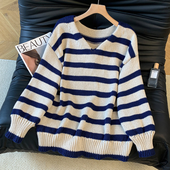 Real shot of large size fashionable design striped V-neck sweater for women in autumn and winter thickened loose slimming sweater top 
Real shot of large size fashionable design striped V-neck sweater for women in autumn and winter thickened loose slimming sweater top