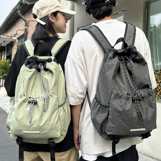 Niche design sense drawstring backpack for female student schoolbag lightweight cycling backpack for men traveling pocket mountaineering bag 
Niche design sense drawstring backpack for female student schoolbag lightweight cycling backpack for men traveling pocket mountaineering bag