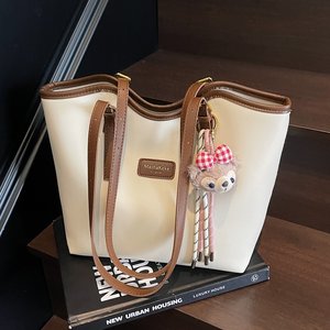 High-end versatile shoulder large bag women's 2025 new fashion simple commuting large capacity work tote bag 
High-end versatile shoulder large bag women's 2025 new fashion simple commuting large capacity work tote bag