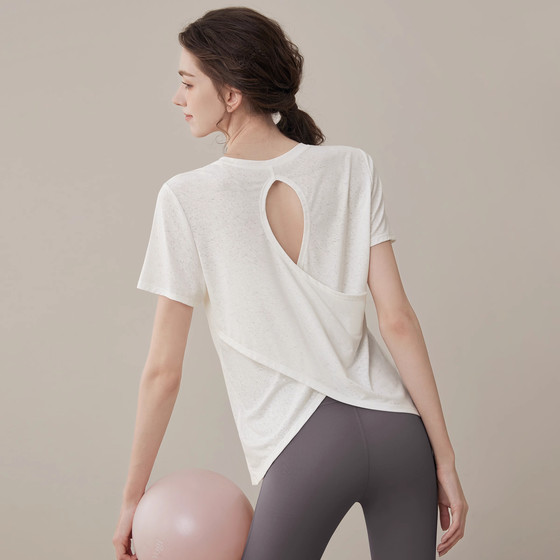 New yoga suit loose short-sleeved summer blouse cross-backless trick pure quick-drying running fitness set
New yoga suit loose short-sleeved summer blouse cross-backless trick pure quick-drying running fitness set