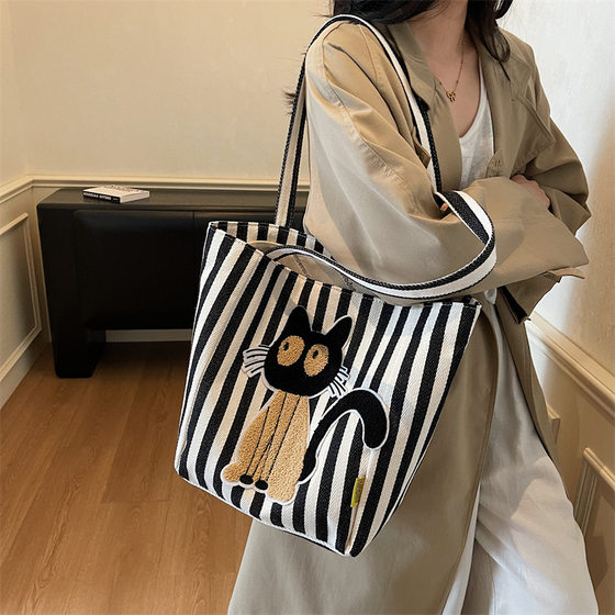 Large-capacity striped canvas bag, women's travel portable shopping bag, men's commuter shoulder bag, mommy bag, tote bag
Large-capacity striped canvas bag, women's travel portable shopping bag, men's commuter shoulder bag, mommy bag, tote bag