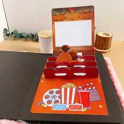 Pop-Up Book with Small Mechanisms That Can Attach Photos to Create a Finished Movie Theater Pop-Up Book with Small Mechanisms That Can Attach Photos to Create a Finished Movie Theater