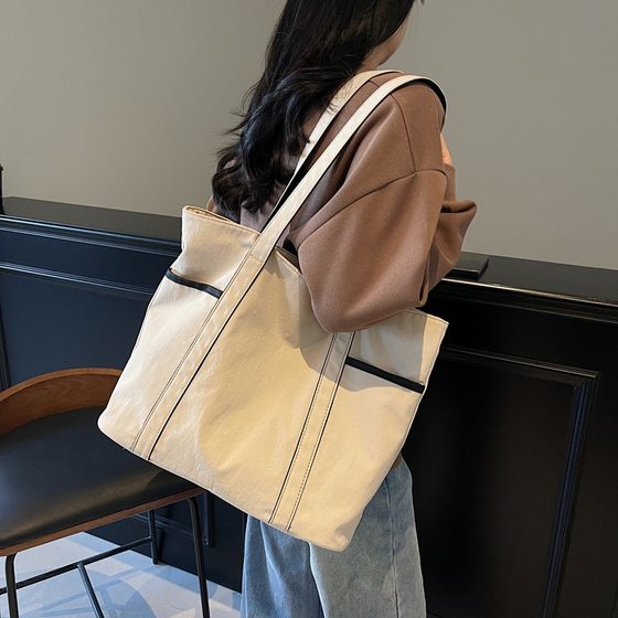 New casual multi-pocket sports shoulder bag Tote bag travel versatile shoulder bag portable casual tote bag
New casual multi-pocket sports shoulder bag Tote bag travel versatile shoulder bag portable casual tote bag