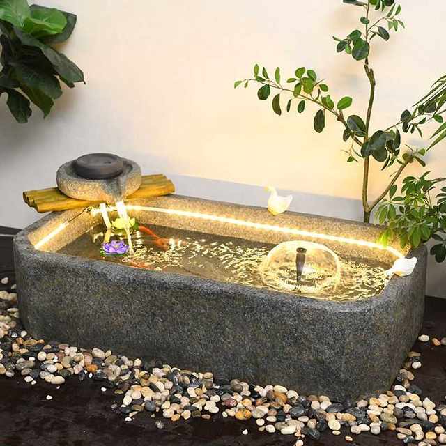 
Creative Chinese-style flowing ornaments Living room, home balcony, garden, teahouse, stone mill landscape, courtyard club, wealth decoration