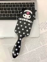 Милая черная расческа