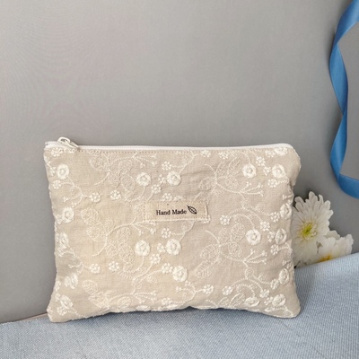 taobao agent Handmade embroidery cosmetics storage bag fabric cosmetic bag portable bag zipper literary cloth bag