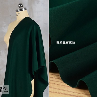 taobao agent Dark green thin section solid air layer quilted fabric smooth encrypted space cotton vertically smooth clothing women's clothing fabric