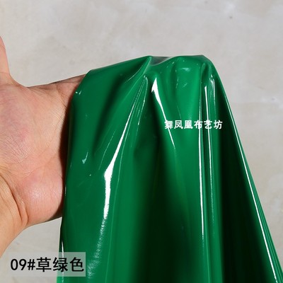 taobao agent Super bright green extremely smooth mirror bright surface soft high -elastic reflective leather imitation leather clothing fabric