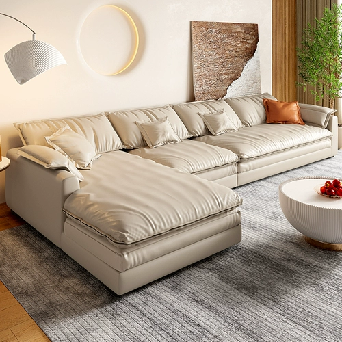 Кожаный диван тофу головного слоя из кожи крема крема ветра прямой три -личный три -игровой ветерок