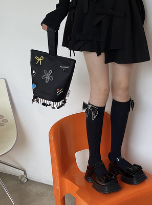 taobao agent CNORAHK original niche design handmade bow rhinestone wild black double -needle medium high tube sweet girl socks