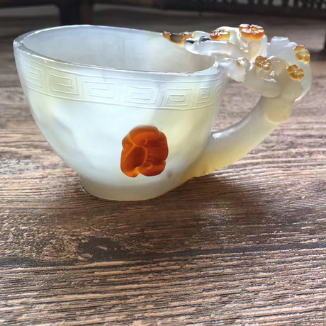 2017-12-07 14:32:58 发布  毛货天然俏色梅花玉髓水草杯主人杯玛瑙