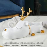 Lucky Cat кладет украшения на бумажные салфетки, простой современный легкий роскошный стиль элитного дома, гостиной, журнальный столик, бумажная коробка с дистанционным управлением