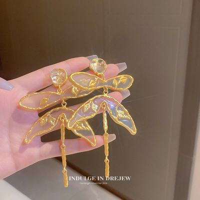 taobao agent Golden summer small design earrings with tassels